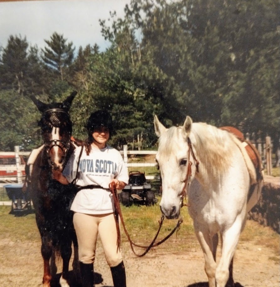 Horse book author Laura Holt-Haslam at Wildwood Stables in 1994 with High Note and Cheval.